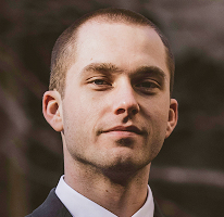 Thomas Whitfield, trading analyst at a cryptocurrency market firm, portrait.